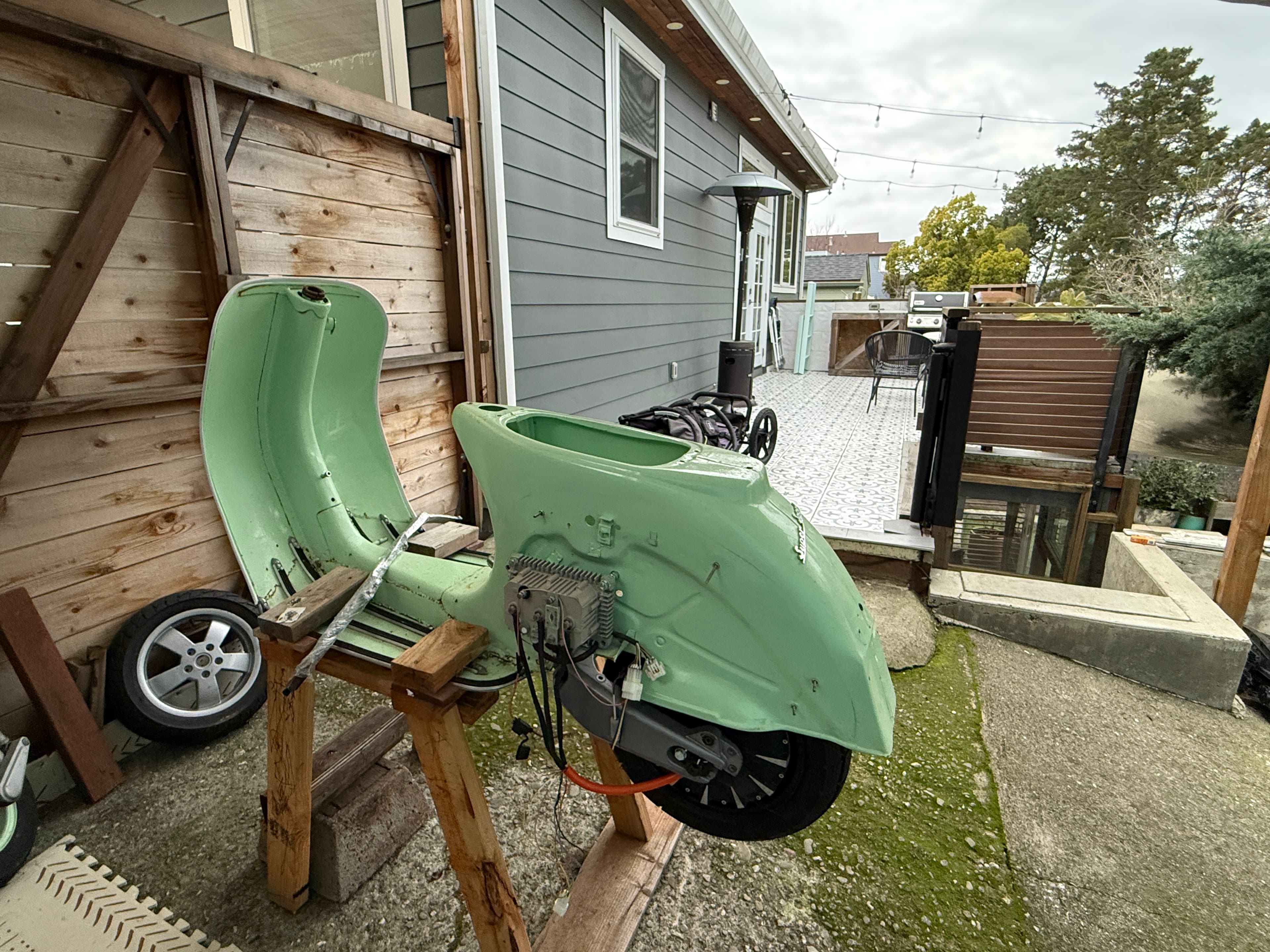 Vespa frame with electric drivetrain installed, rear view
